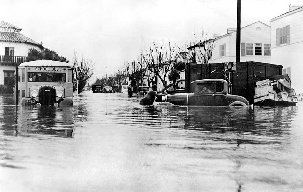 Flooding on 43rd Place near Leimert Boulevard, downtown L.A., 1938.