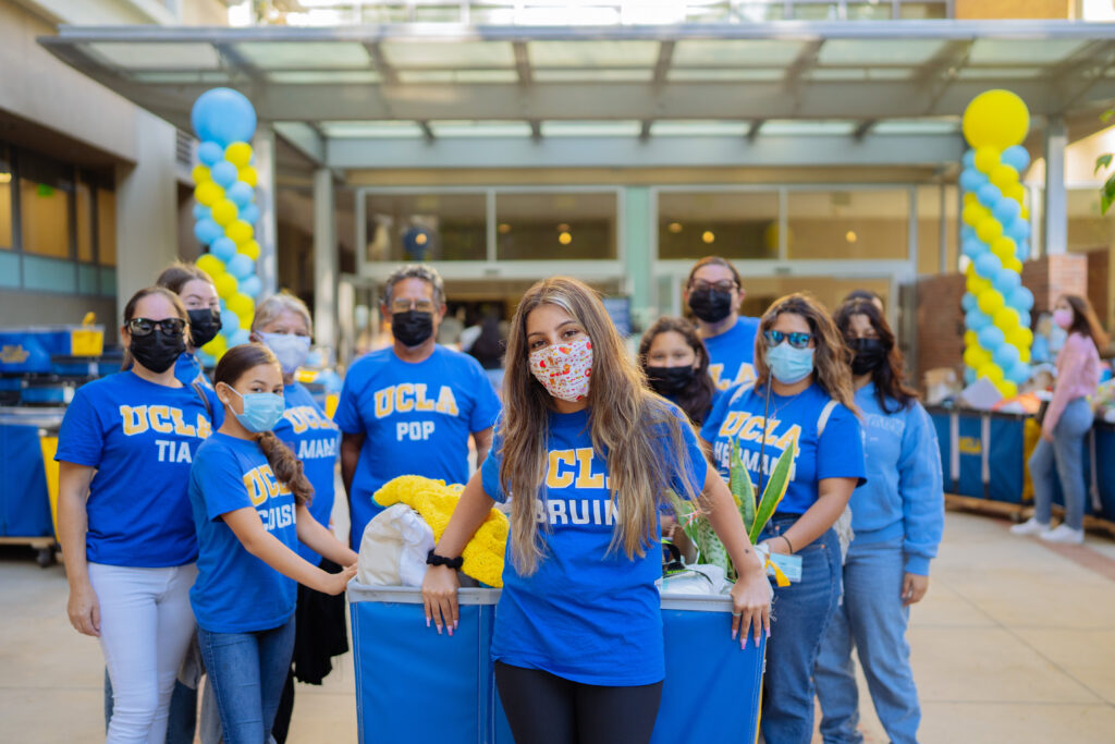 Incoming student Emelin Vivar poses with family on her move-in day to Sproul Hall at UCLA.