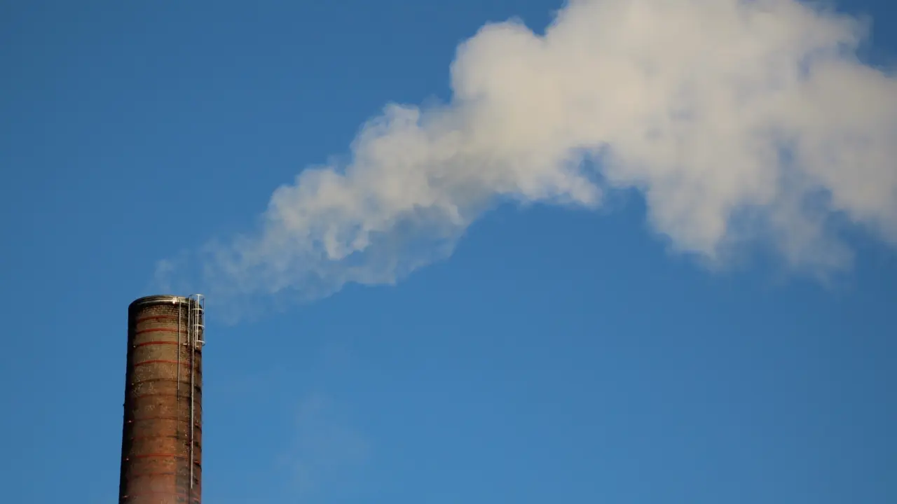 Smokestack emitting smoke