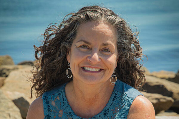 Catalina Martinez in front of the Ocean / Credit: Nora Lewis