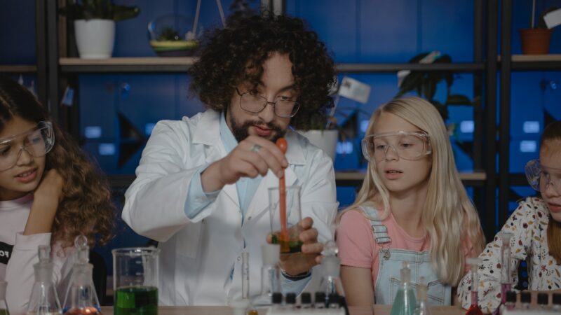 Science teacher in lab with students Tima Miroshnichenko Pexels