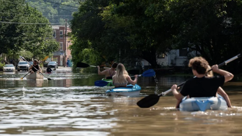 People kayak up and down the flooded waters of Elm Street on July 11, 2023 in Montpelier, Vermont. Eight inches of rain fell over 48 hours | Kylie Cooper