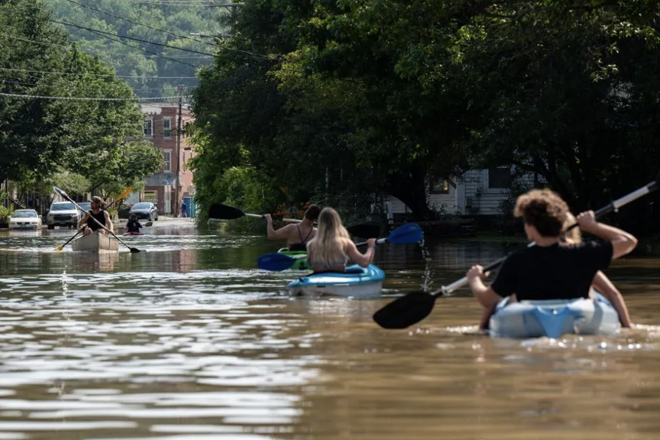 People kayak up and down the flooded waters of Elm Street on July 11, 2023 in Montpelier, Vermont. Eight inches of rain fell over 48 hours | Kylie Cooper