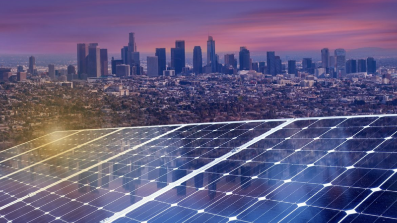 iStock com: samafoto : LA skyline with solar panels