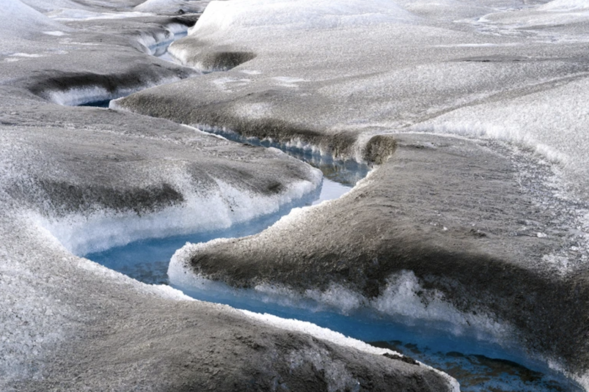 Brown sediment marks rapidly melting ice on the Greenland ice sheet.Credit: Martin Zwick/Reda&Co/Universal Images Group via Getty