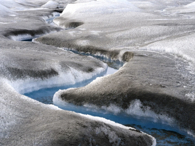 Brown sediment marks rapidly melting ice on the Greenland ice sheet.Credit: Martin Zwick/Reda&Co/Universal Images Group via Getty