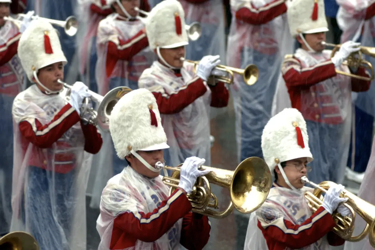 Los Angeles Unified School District Honor Band is wrapped in plastic during the 117th Annual Rose Parade on Monday, Jan. 2, 2006, in Pasadena, Calif. It rained on the Rose Parade for the first time in more than a half century. (Photo by Leo Jarzomb, Pasadena Star-News/SCNG)