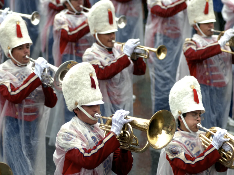 Los Angeles Unified School District Honor Band is wrapped in plastic during the 117th Annual Rose Parade on Monday, Jan. 2, 2006, in Pasadena, Calif. It rained on the Rose Parade for the first time in more than a half century. (Photo by Leo Jarzomb, Pasadena Star-News/SCNG)