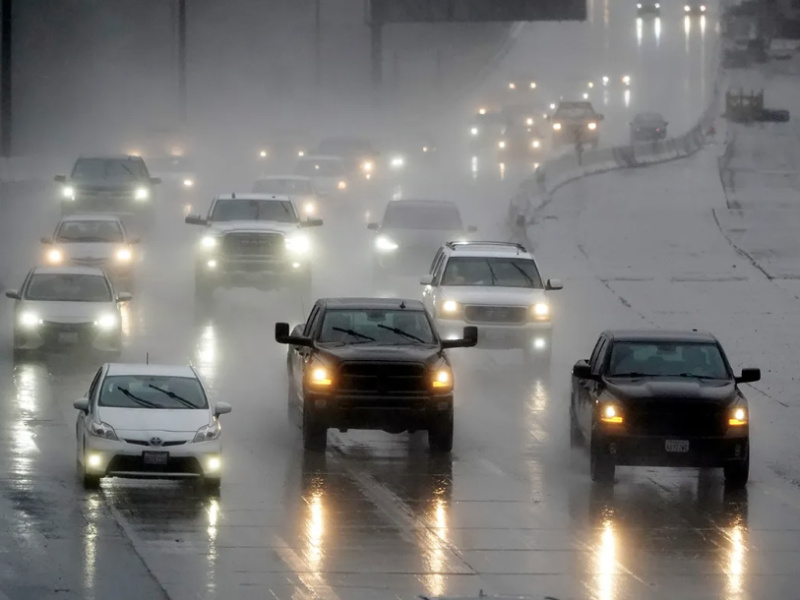 Cars driving on the freeway in the rain AP Photo Marcio Jose Sanchez