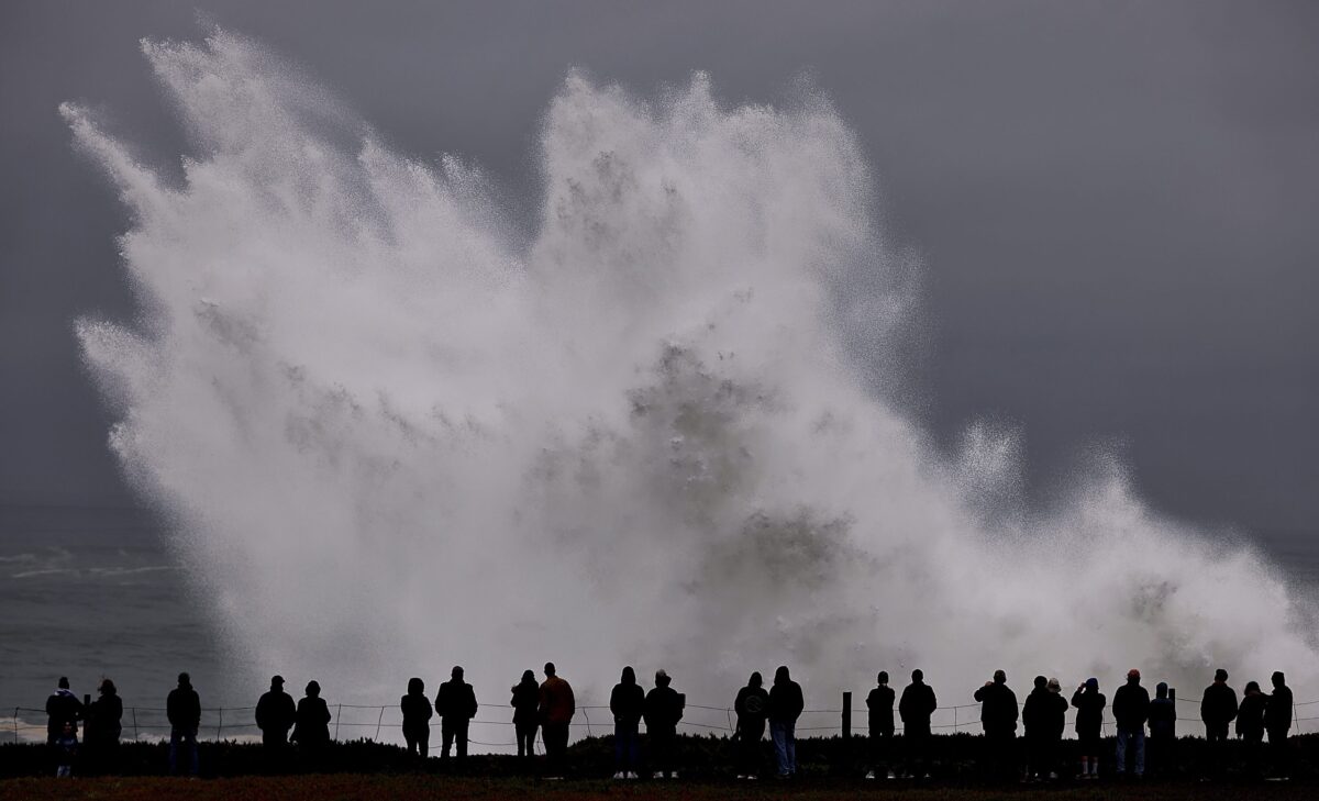 Large waves crash in to Duncan's Landing north of Carmet, Ca., Thursday, Dec. 28, 2023 due to a Pacific storm pummeling Northern California. (Kent Porter/The Press Democrat via AP)