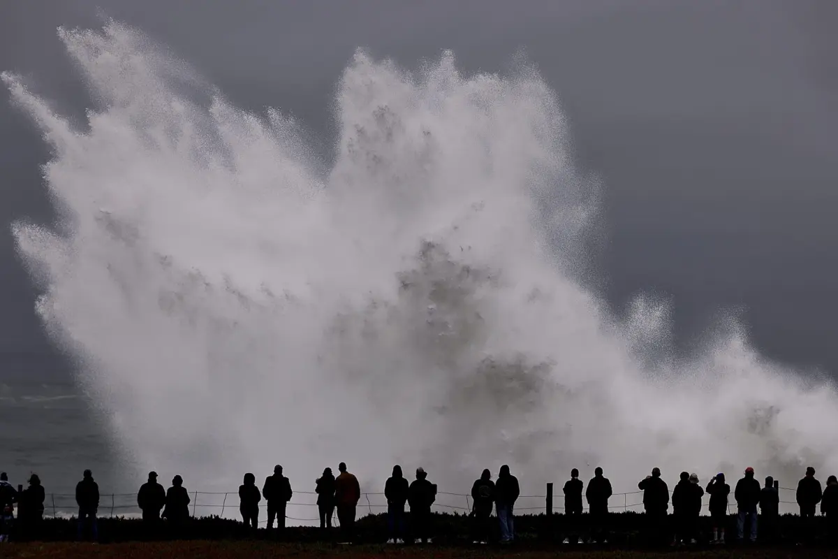 Large waves crash in to Duncan's Landing north of Carmet, Ca., Thursday, Dec. 28, 2023 due to a Pacific storm pummeling Northern California. (Kent Porter/The Press Democrat via AP)