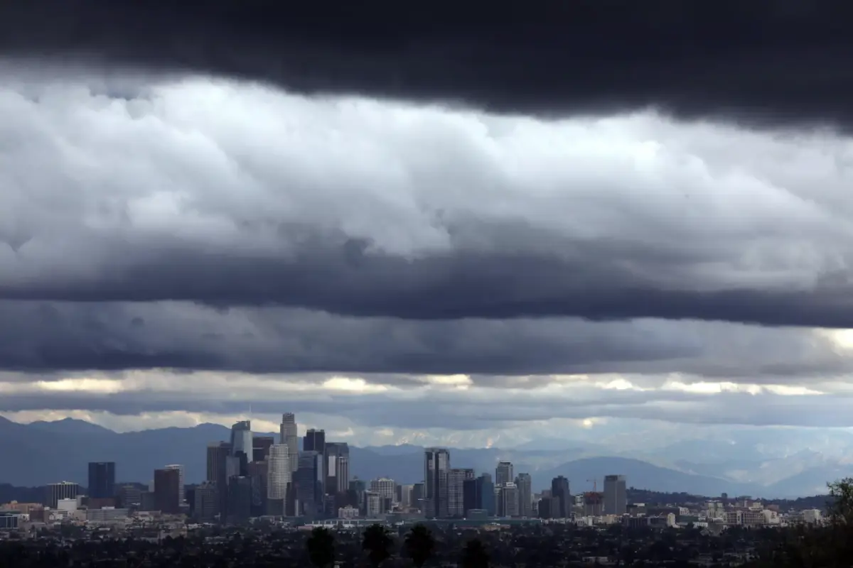 Despite a recent spate of storms that hit California, the Sierra Nevada is suffering a severe, early season ‘snow drought,’ experts say. Here, storm clouds dwarf downtown Los Angeles on Dec. 21, 2023. Credit Genaro Molina. Los Angeles Times