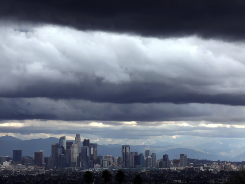 Despite a recent spate of storms that hit California, the Sierra Nevada is suffering a severe, early season ‘snow drought,’ experts say. Here, storm clouds dwarf downtown Los Angeles on Dec. 21, 2023. Credit Genaro Molina. Los Angeles Times