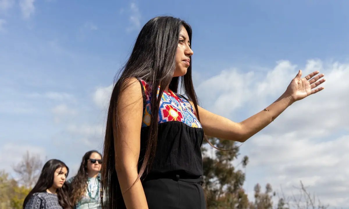 Ary Amaya looks out over the Chief Ya’anna Regenerative Learning Village in northeast Los Angeles, an open space acquired in 2022 by Indigenous leaders and educators from the Anawakalmekak school.