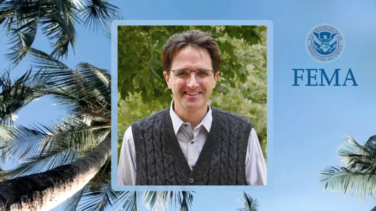 Photo of Travis Longcore with palm trees, blue sky, and FEMA logo in background.