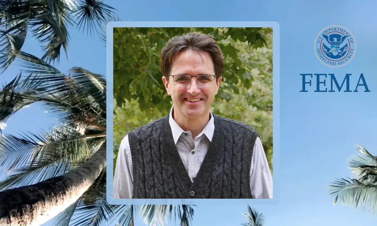 Photo of Travis Longcore with palm trees, blue sky, and FEMA logo in background.