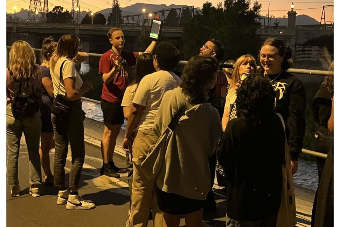 UCLA postdoc Joseph Curti leading public on evening bat walk.
