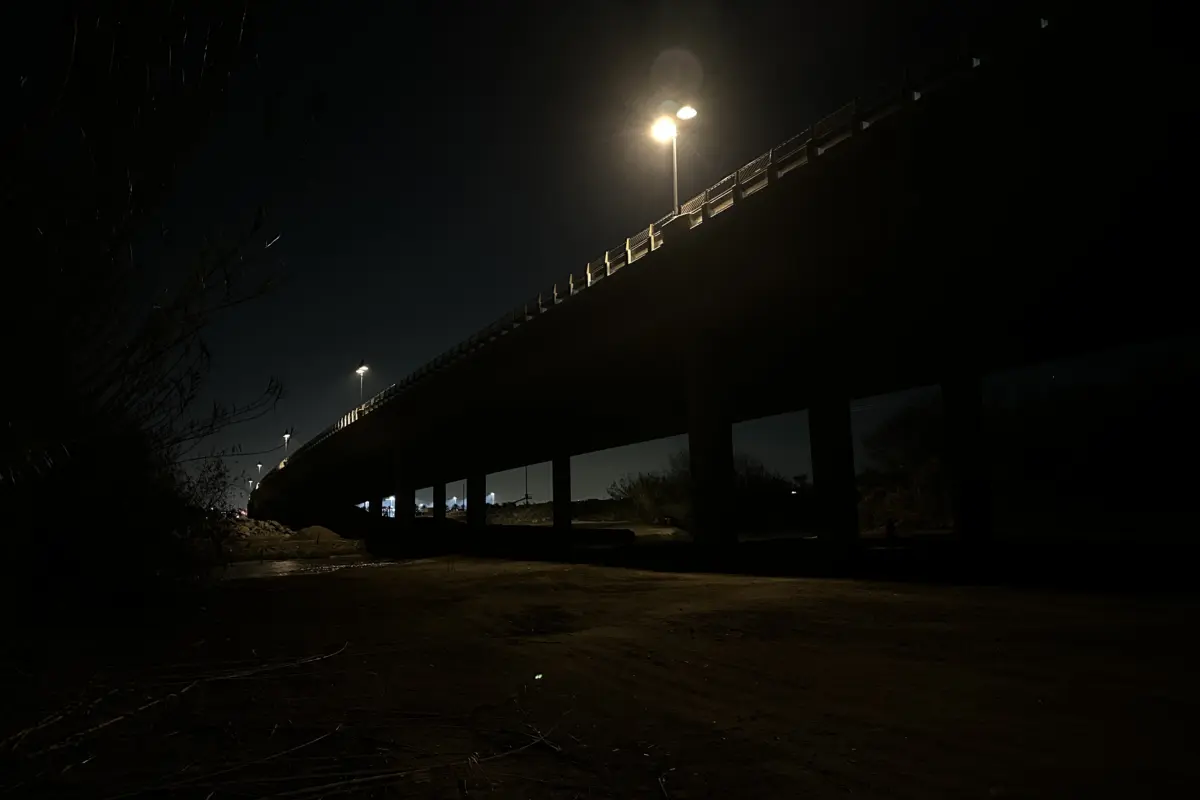 Street light over urban bridge at night