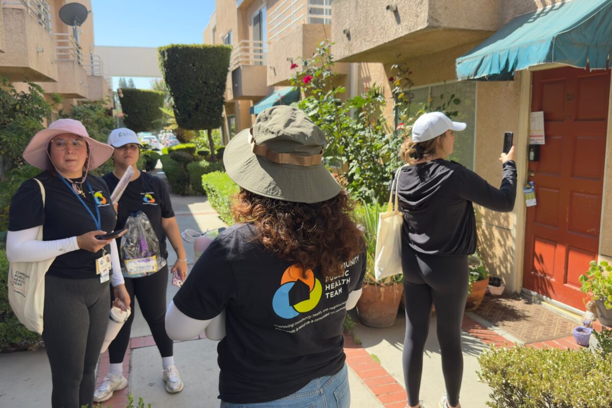 Four LARC workers going home to home.