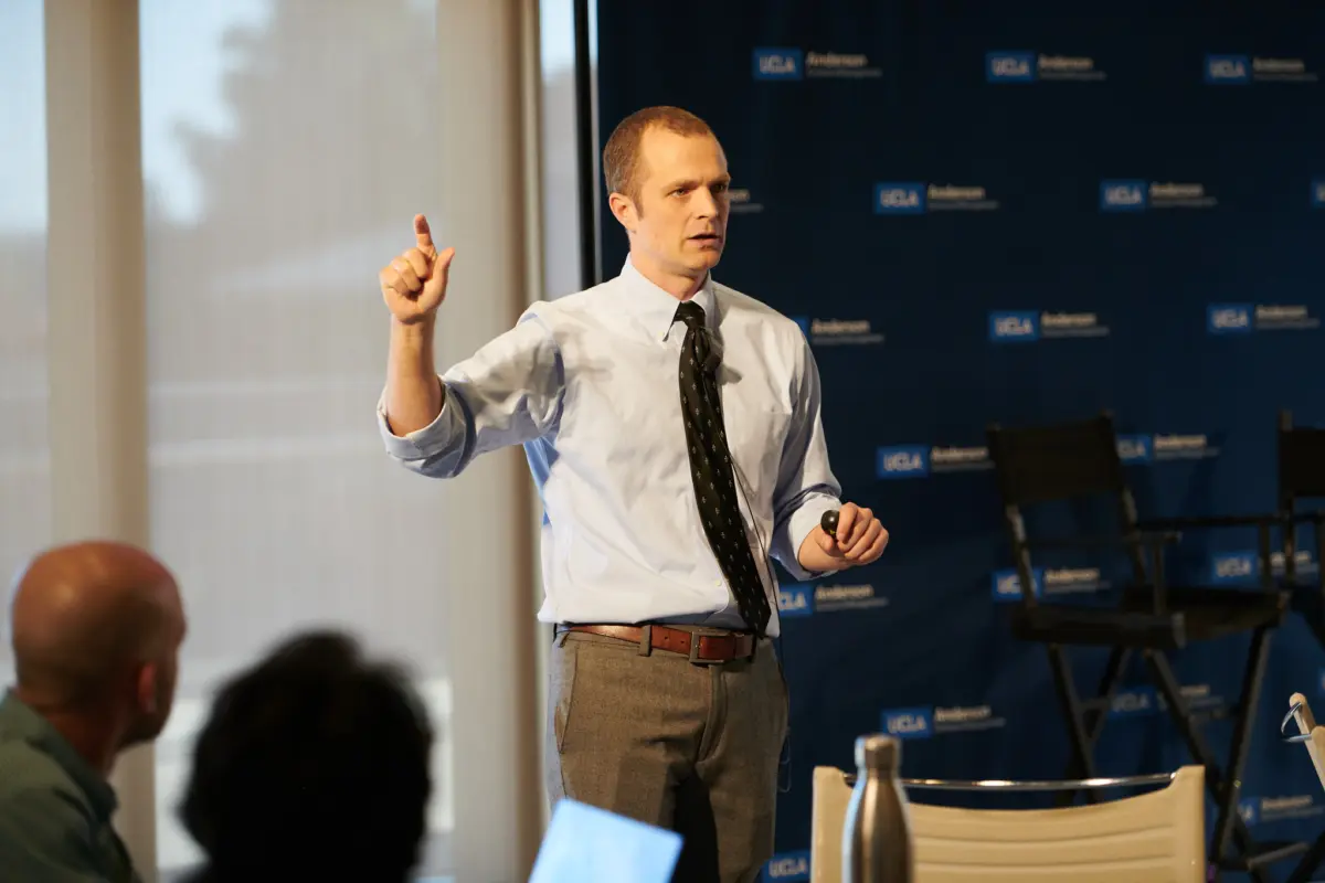 Tyson Timmer presenting in classroom