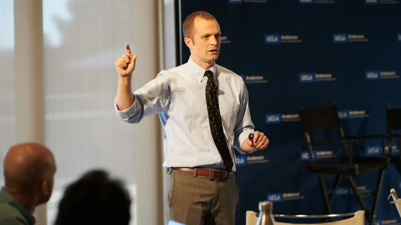 Tyson Timmer presenting in classroom