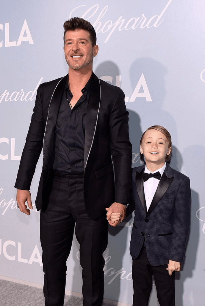 daily mail: robin thicke and son julian look sharp in suits as they attend the hollywood for science gala