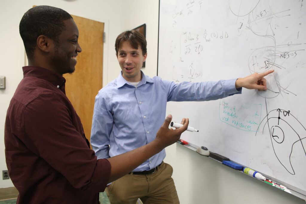 Postdoctoral scientist Adeyemi Adebiyi and Jasper Kok, associate professor of atmospheric and oceanic sciences.