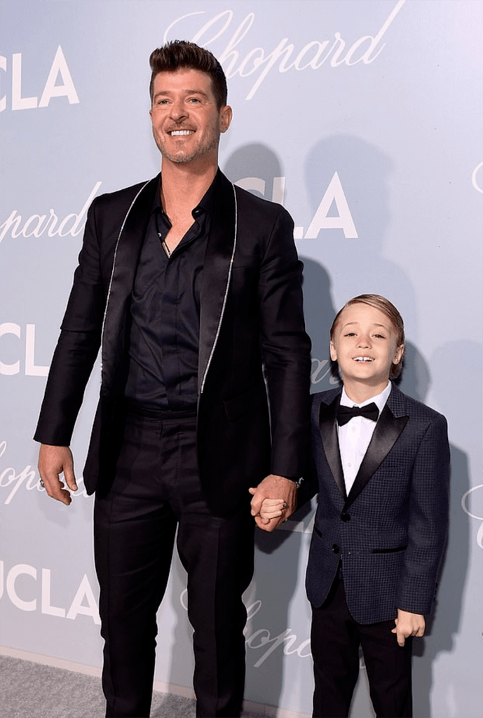 daily mail: robin thicke and son julian look sharp in suits as they attend the hollywood for science gala