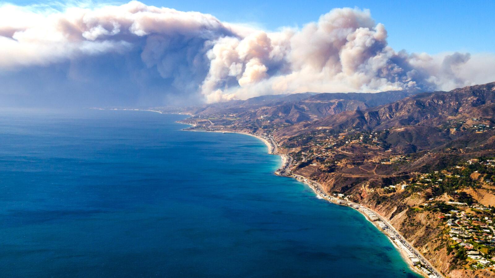 The Woolsey Fire smoke plume looms over Malibu's iconic coastline.